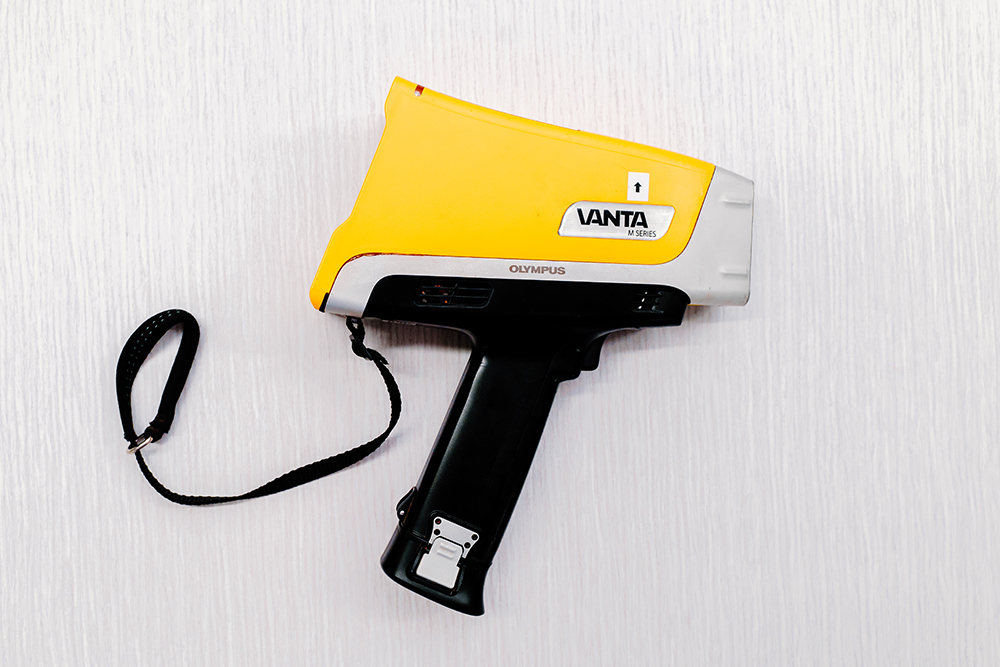 A portable XRF lying on its side